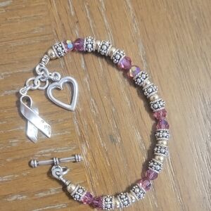 Beautiful Pink Beaded bracelet with Ornate Silvertone Beads sterling ribbon